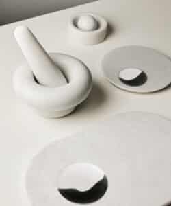 White sculpted pieces. Design Mumbai