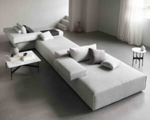 Ariel view of a modern contemporary lounge with a grey sofa. Design Mumbai.