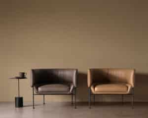 Two brown leather chairs. Design Mumbai.